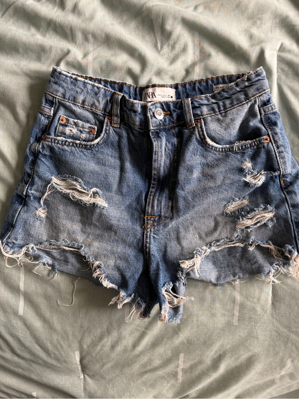 Zara Distressed Light Blue Denim Cutoff Shorts